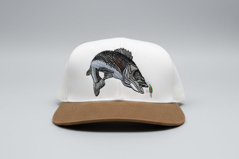 off white front and tan bill with fish design on a vintage cotton hat