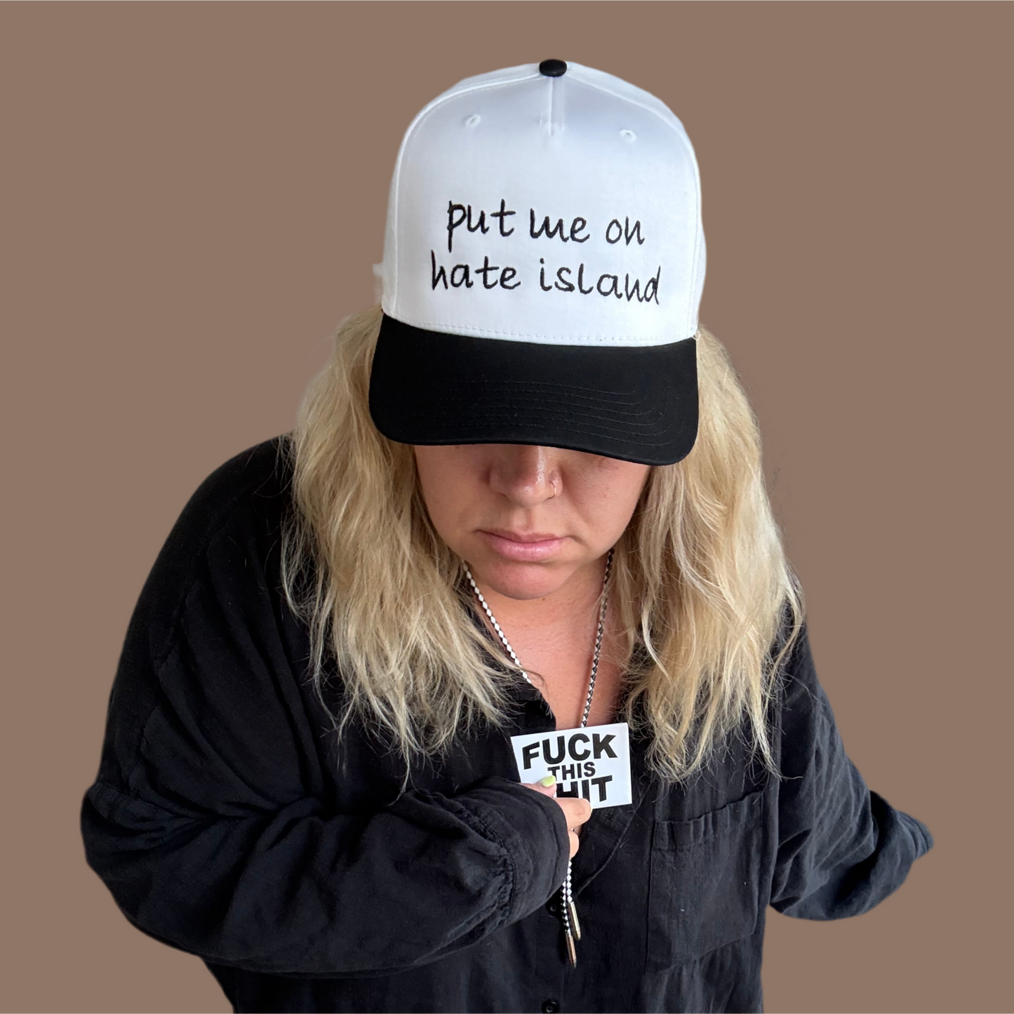 put me on hate island Embroidered Hat