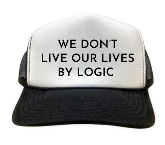 We Don’t Live Our Lives By Logic Trucker Hat